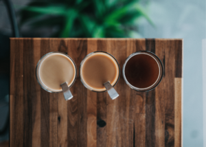 How to Use a Percolator, photo of 3 coffee cups each with light, medium, and dark cofffee