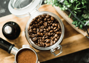 kitchenaid burr grinder review, photo of coffee beans in glass jar